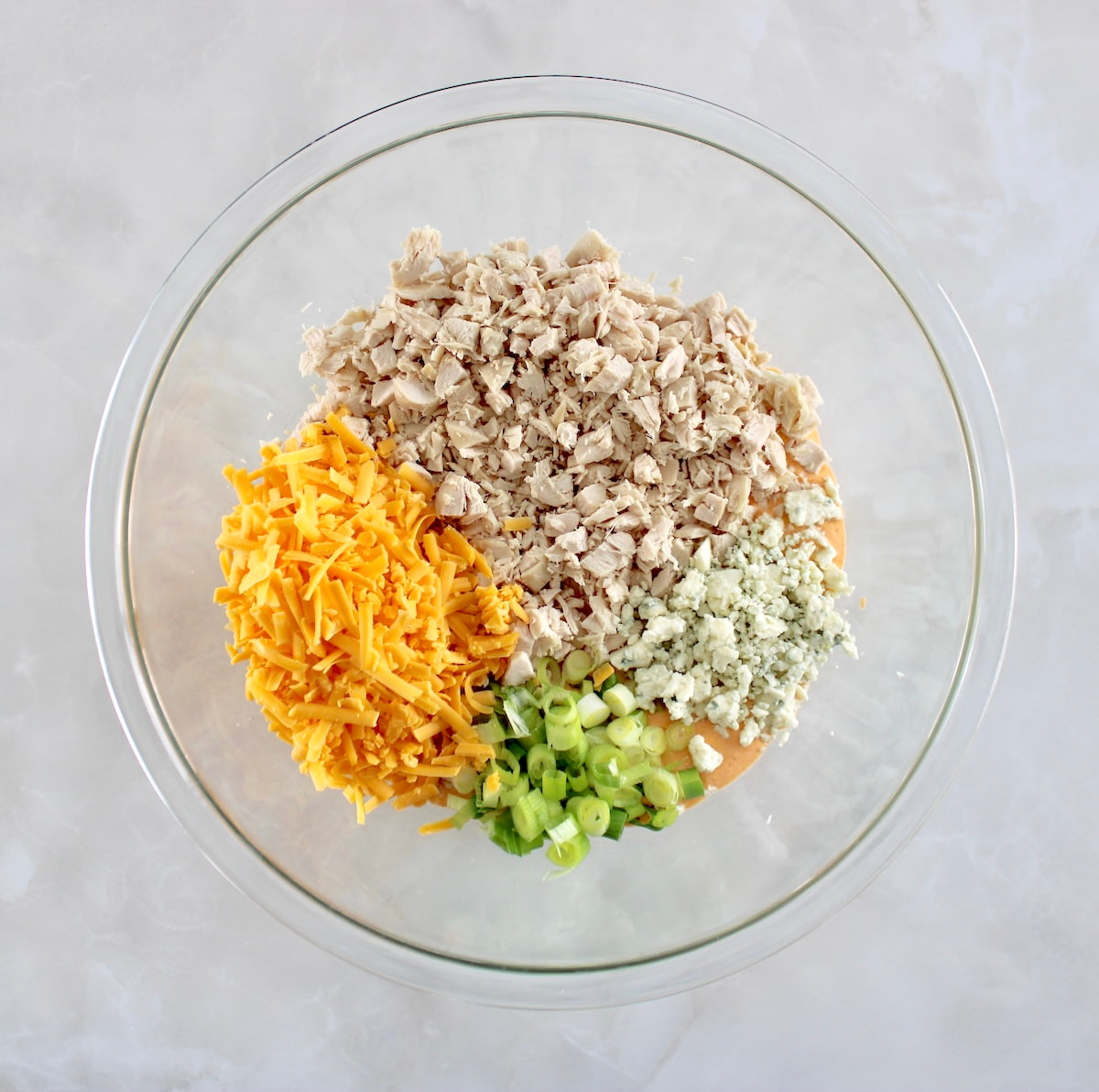 ingredients in glass bowl in sections unmixed