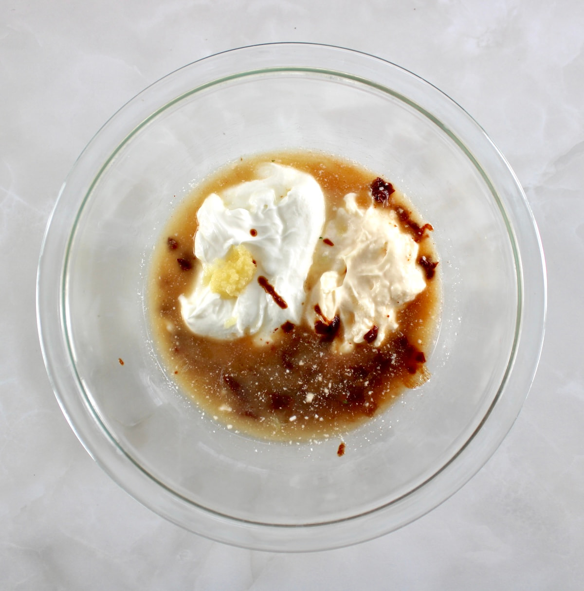 Cowboy Coleslaw dressing ingredients in glass bowl unmixed