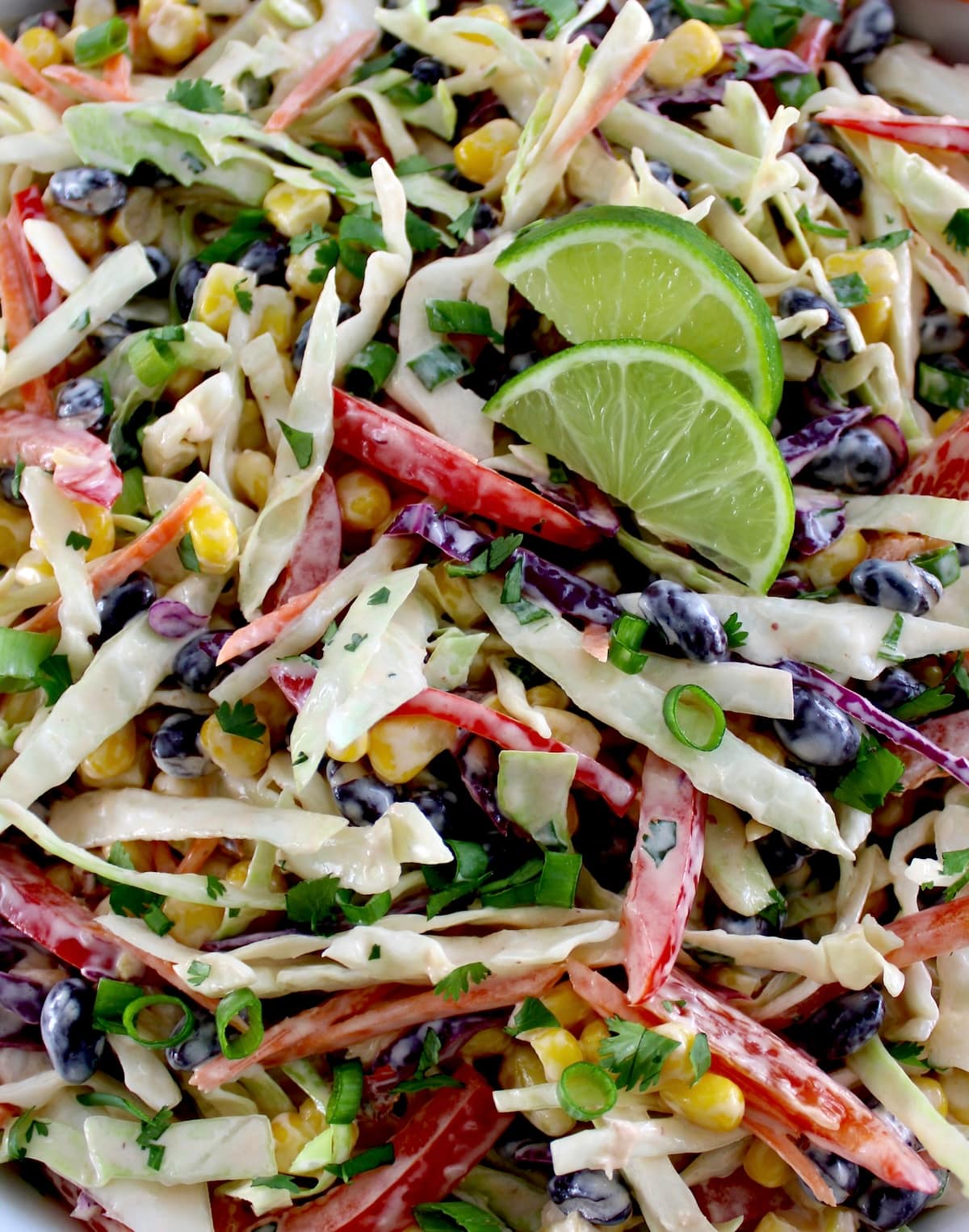 closeup of Cowboy Coleslaw with 2 lime slices