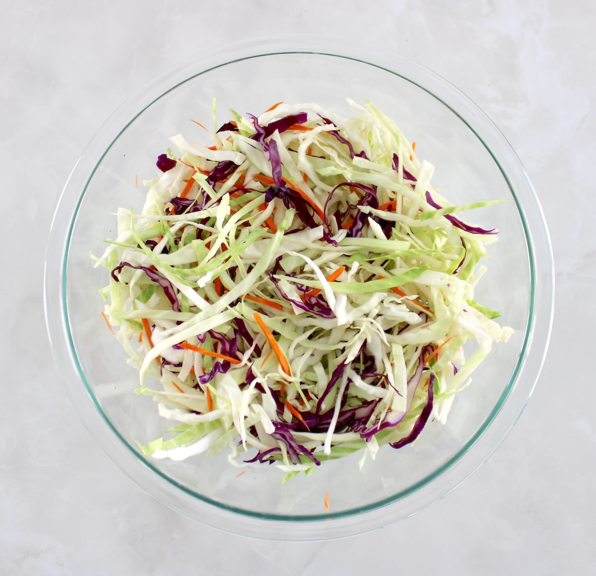coleslaw mix in glass bowl