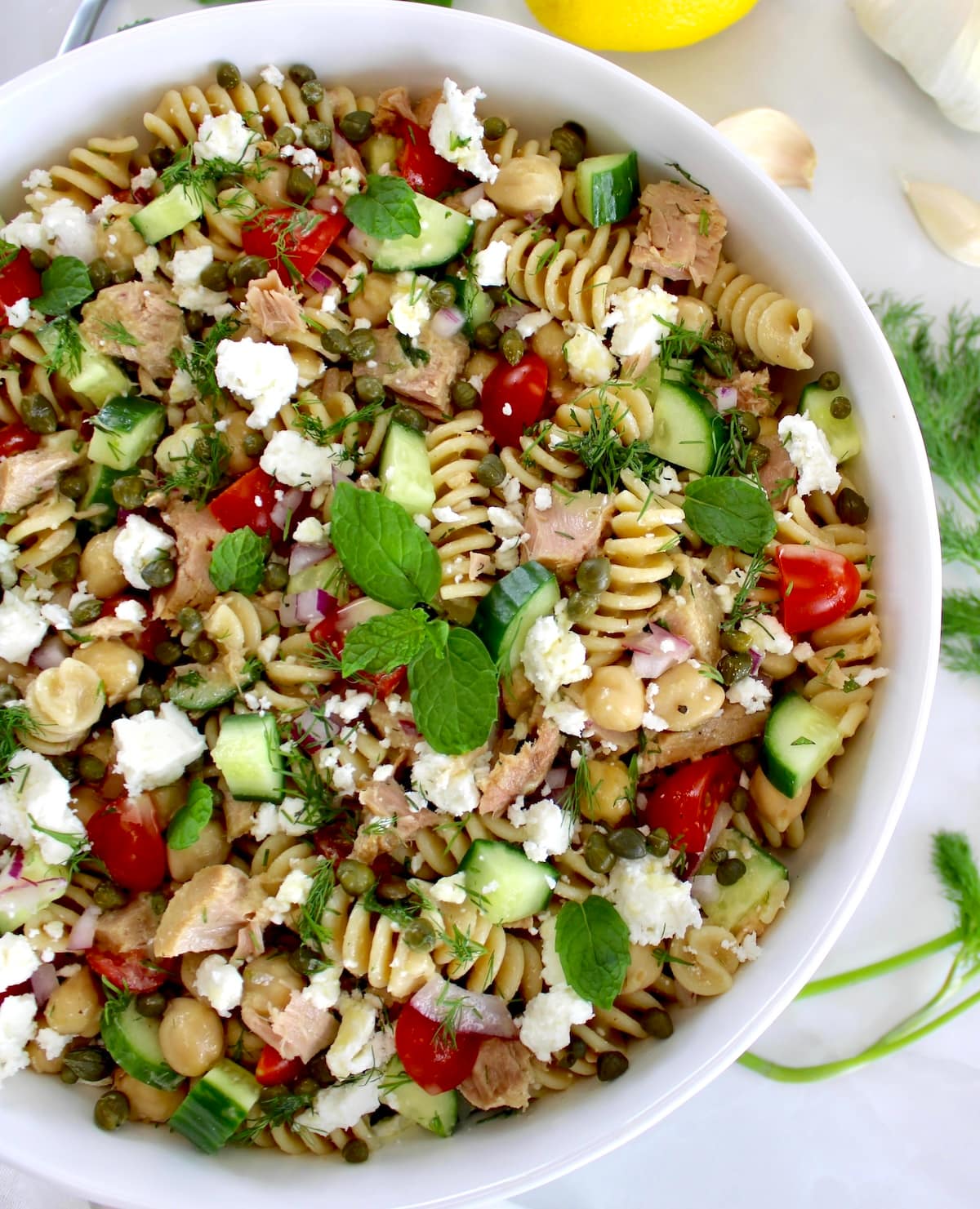 overhead view of Chickpea Tuna Pasta Salad in white bowl